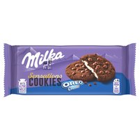 Milka Cookie Sensations Ciastka kakaowe z kawałkami czekolady i nadzieniem o smaku waniliowym 156 g