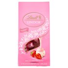 Lindt Lindor Pralinki z białej czekolady z kawałkami truskawek i śmietankowym nadzieniem 100 g (1)